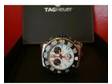 tag heuer F1 chronograph. white face raiknonen model....