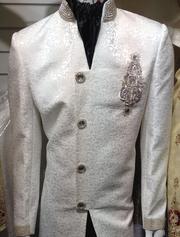 Buy White sherwani with silver embroidery from Geeta Arts