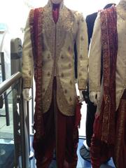 Buy Gold w/ Maroon Sherwani and Doti from Geeta Arts